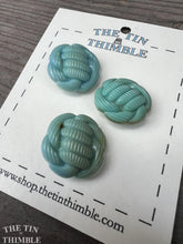 Load image into Gallery viewer, Authentic Vintage Blue Knot Buttons - Three / 1940s Blue Plastic Knot Buttons / Vintage Sewing Notions / Vintage Sewing