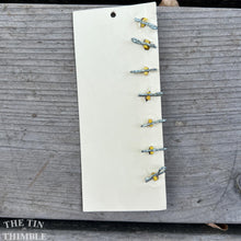 Load image into Gallery viewer, Vintage Plastic Buttons - Card of 7 - 12mm or 1/2 Inch