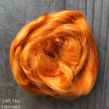 Load image into Gallery viewer, Cultivated Bombyx (Mulberry) Silk Fiber for Spinning or Felting in Marigold Orange - 3.5 Grams or More

