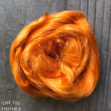 Load image into Gallery viewer, Cultivated Bombyx (Mulberry) Silk Fiber for Spinning or Felting in Marigold Orange - 3.5 Grams or More