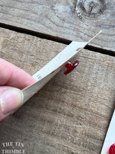 Load image into Gallery viewer, Vintage Red Plastic Cardigan Buttons for Sweaters - Card of Seven - 15mm (5/8 inch)
