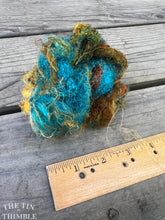 Load image into Gallery viewer, Hand Dyed Throwsters Waste Silk / 1/8 Ounce of 100% Silk Threads in the color &#39;Southwest&#39;
