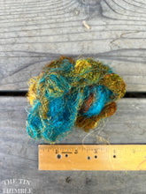 Load image into Gallery viewer, Hand Dyed Throwsters Waste Silk / 1/8 Ounce of 100% Silk Threads in the color &#39;Southwest&#39;
