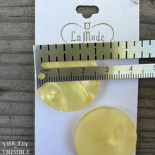 Load image into Gallery viewer, Vintage Buttons - Yellow Plastic Buttons - Card of Two - 30mm or 1 1/8 Inch
