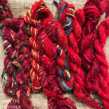 Load image into Gallery viewer, Fiber Frenzy Bundle / ONe Bundle of Yarn in Red/ Great for Felting / Approximately 24 Yards / 8 Strands Each 3 Yards Long
