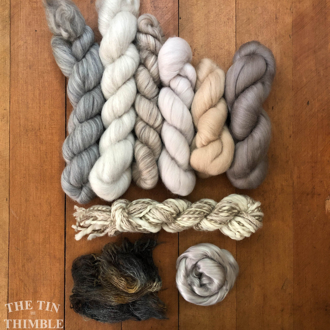 neutral colored wool roving with embellishment fibers