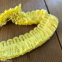 Load image into Gallery viewer, Bright Yellow Cotton Fringe Trim by the Half Yard - 1 1/8&quot; Wide
