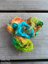 Load image into Gallery viewer, Hand Dyed Throwsters Waste Silk / 1/8 Ounce of 100% Silk Threads in the color &#39;Southwest&#39;
