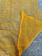 Load image into Gallery viewer, Hand Dyed Cotton Gauze Scrim Cheesecloth for Sewing or Nuno Felting in Gold / Scarf for Felting or Wearing as Is / By the Yard
